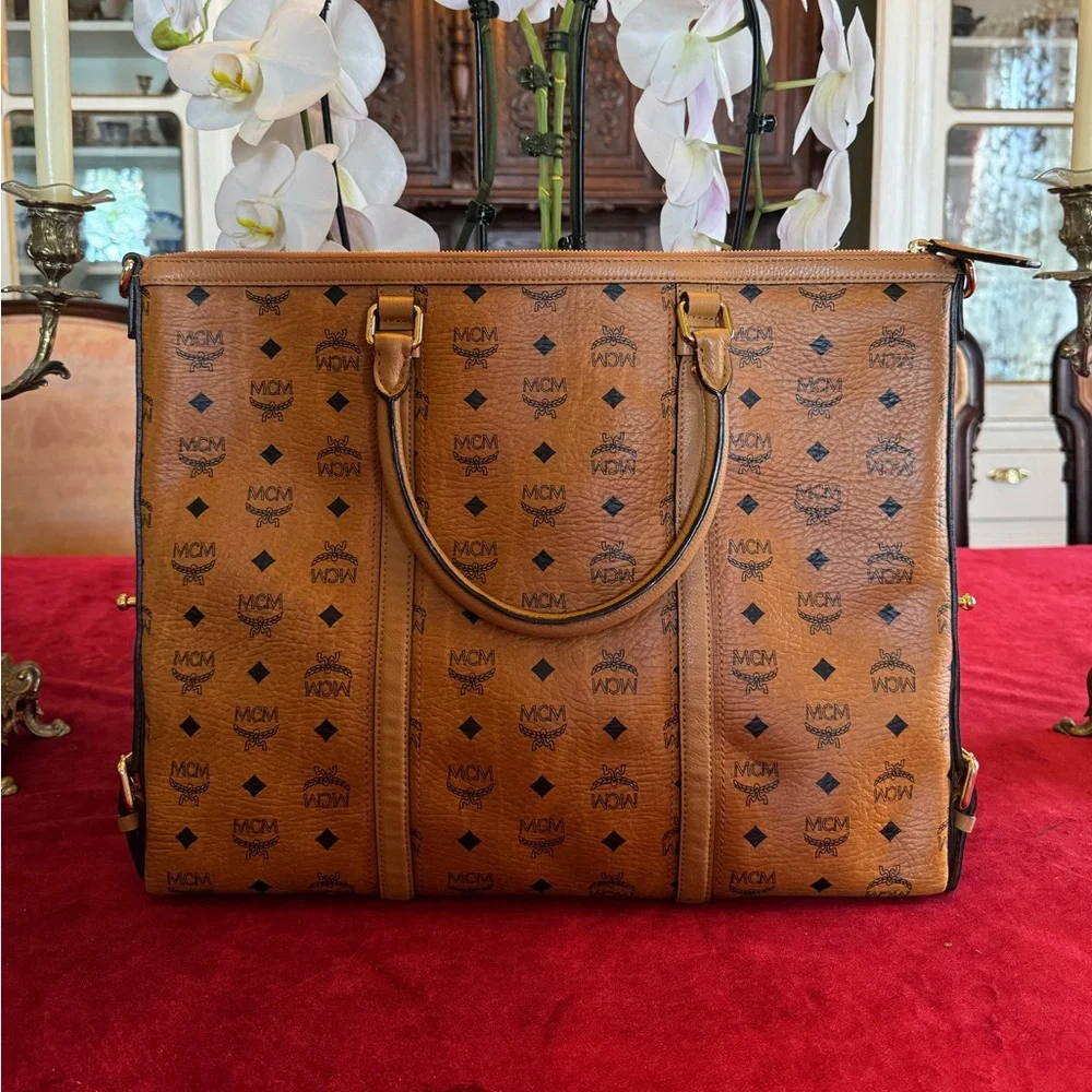 💯 Guaranteed Authentic MCM Cognac Visetos Laptop Bag with strap🥀🥀PRICE IS FIRM🥀🥀